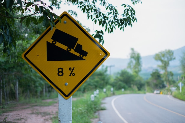 Premium Photo | Traffic signs warning steep road sign to slope a steep