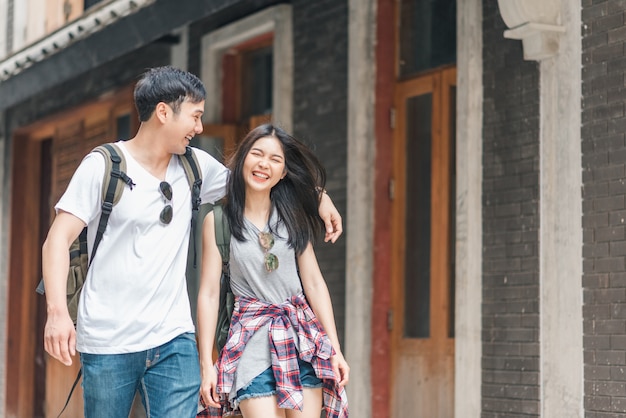 Traveler asian backpacker couple feeling happy traveling in beijing, china Free Photo