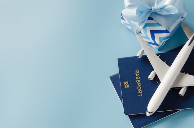 Download Free Traveling As Gift Toy Airplane With Passports And Gift Box Use our free logo maker to create a logo and build your brand. Put your logo on business cards, promotional products, or your website for brand visibility.