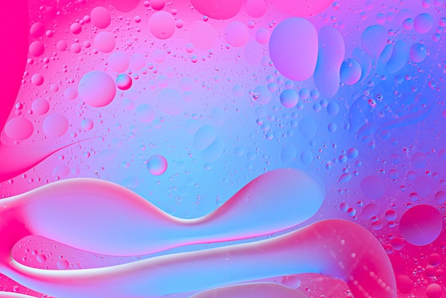 Premium Photo | Trendy pink and blue background of smears and bubbles ...