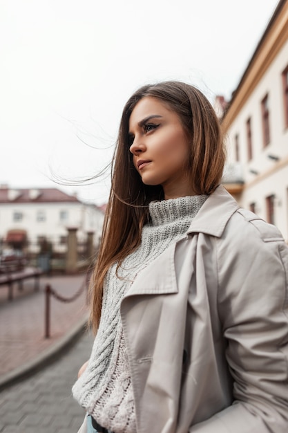 Premium Photo | Trendy portrait of a young woman in stylish clothes on ...