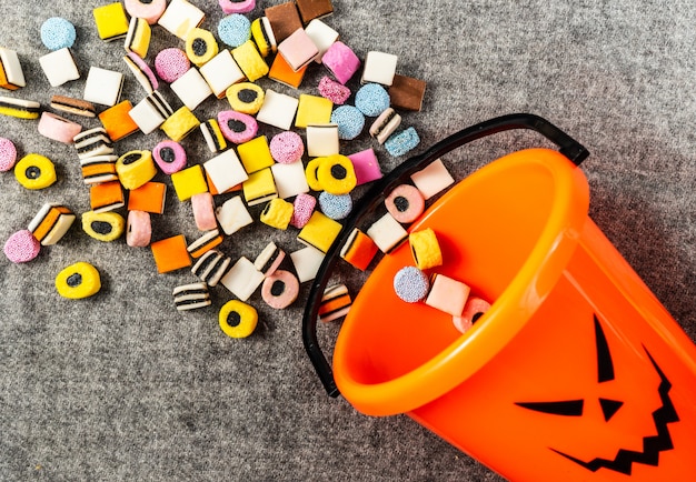 Premium Photo | Trick Or Treat Pumpkin Bucket On Side For Collecting ...