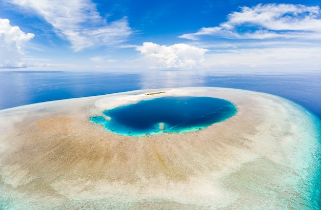 Premium Photo | Tropical atoll with coral reef