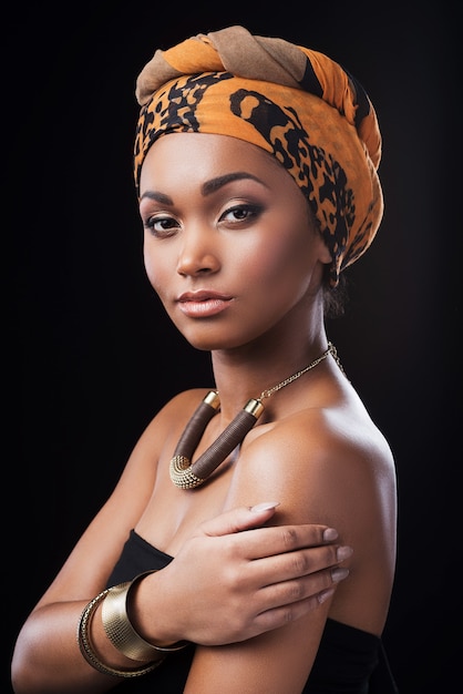 Premium Photo True African Beauty Beautiful African Woman Wearing A Headscarf And Looking At