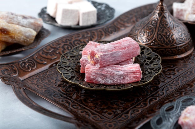 Premium Photo | Turkish delight closeup oriental sweets with mix nuts ...