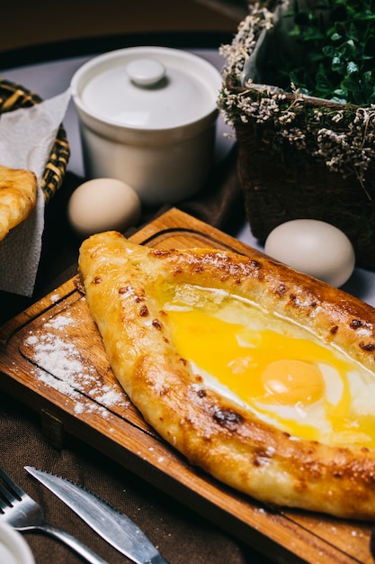Free Photo | Turkish pide bread with fried egg.
