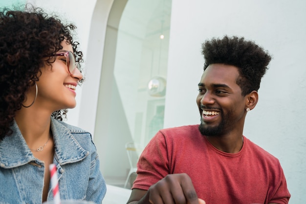 Premium Photo | Two afro friends having fun together.