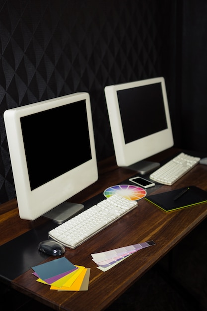 Two Computers On A Desk Photo Premium Download