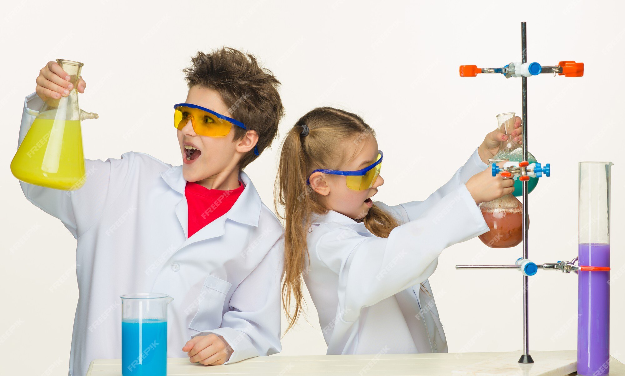 Premium Photo | Two cute children at chemistry lesson making ...