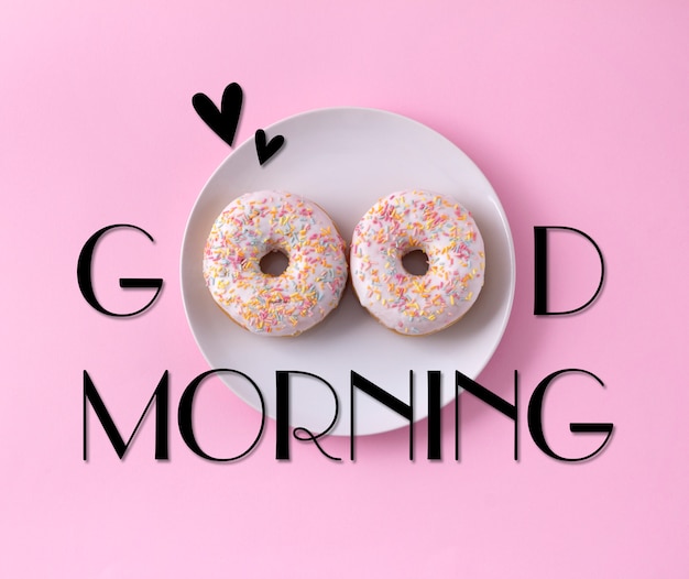 Premium Photo Two Donuts On The Plate Good Morning Greeting Written