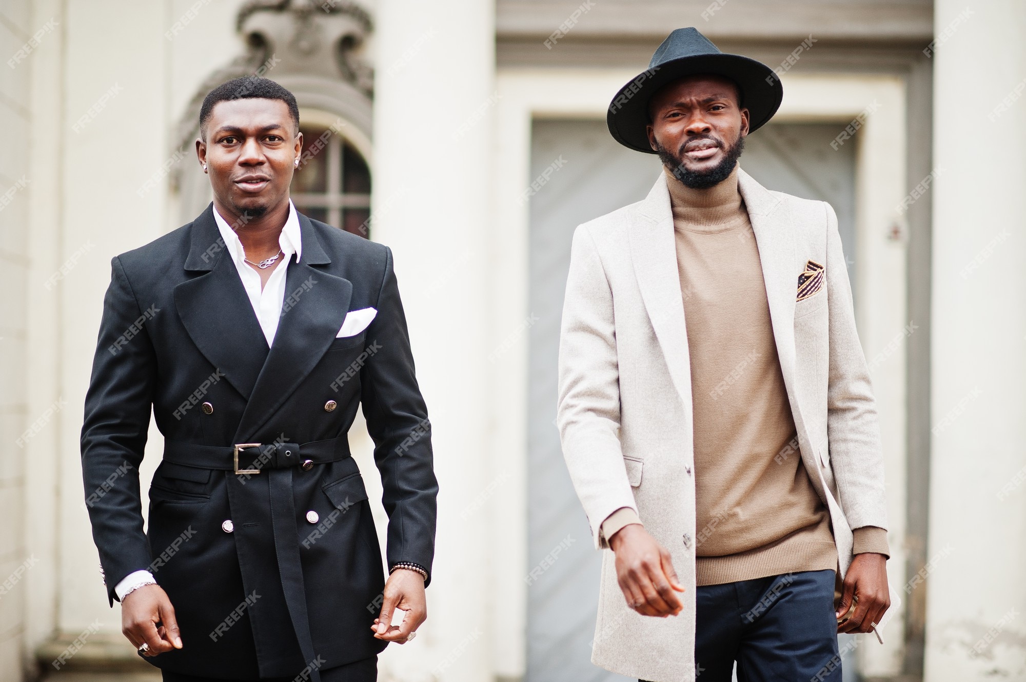 Premium Photo | Two fashion black men walking on street. fashionable ...