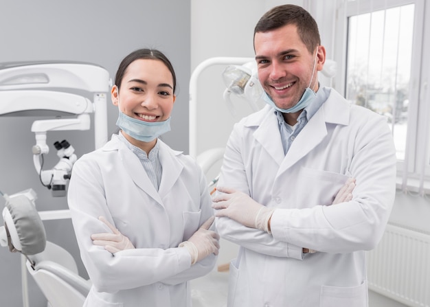 Premium Photo | Two friendly dentists