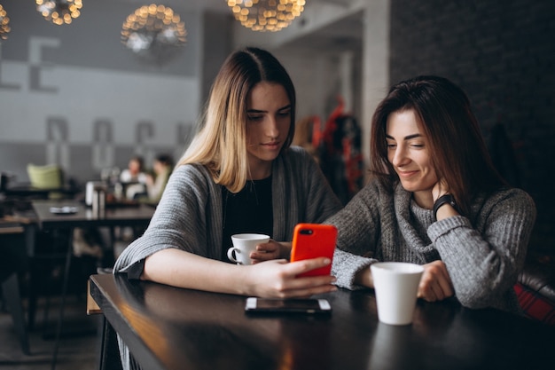 [Image: two-girls-having-coffee-cafe-winter_1303-6199.jpg]