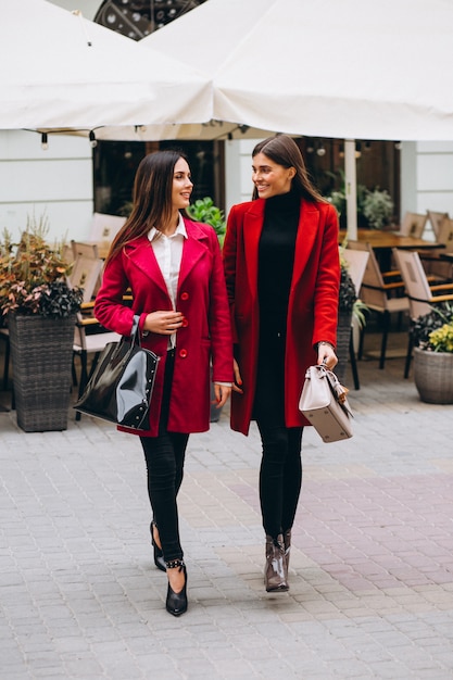 Free Photo | Two girls in red coats models