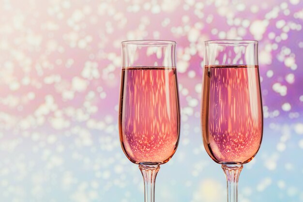 | Two of rose champagne a light snow bokeh