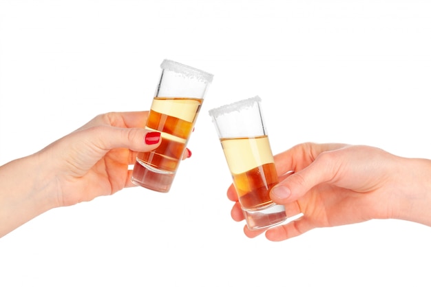 Premium Photo Two Hands Clinking Glasses With Shot Cocktail Isolated On White 6043