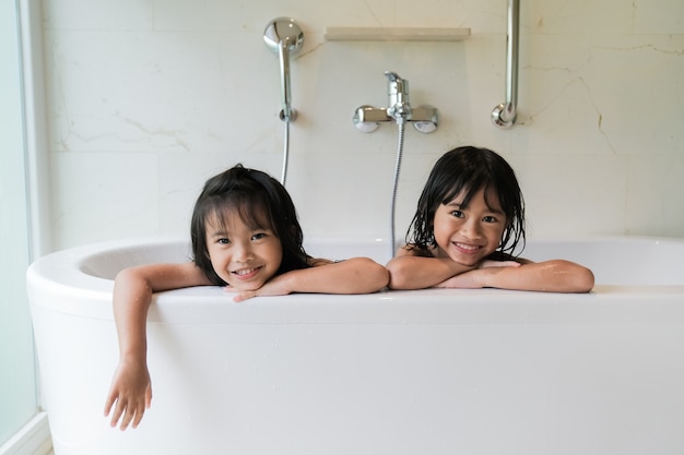 Happy Girl Taking A Bath Together, The Girl In The Bathtub