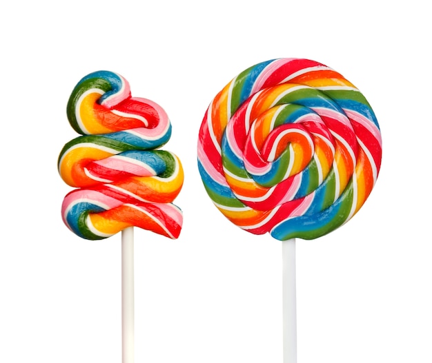 Premium Photo Two lollipops with many colors in a spiral