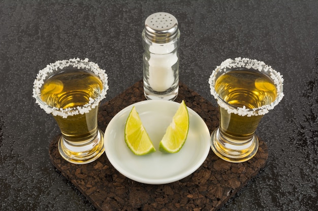 premium-photo-two-shots-of-gold-tequila