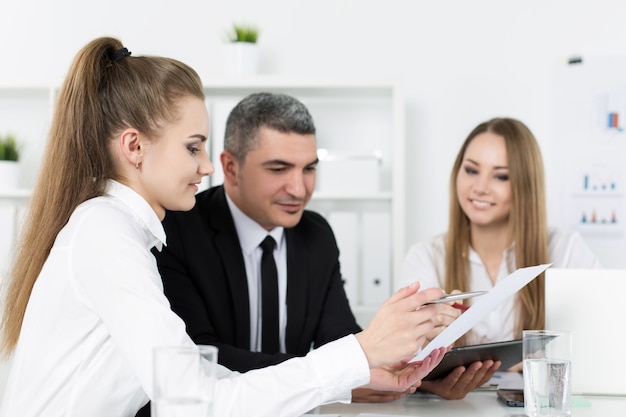 Premium Photo | Two young beautiful business women consulting with ...