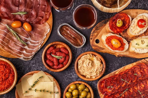 Premium Photo | Typical spanish tapas concept. concept include slices ...