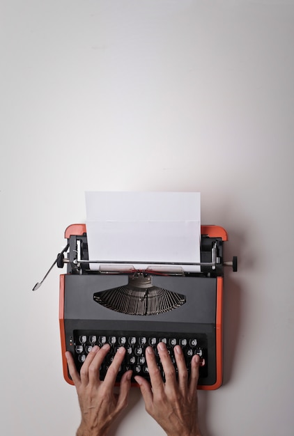 Premium Photo | Typing on a typewriter