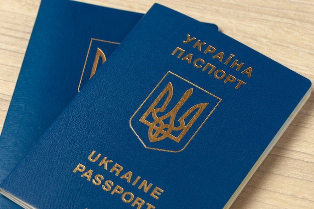 Premium Photo | Ukrainian international biometric passport on light ...