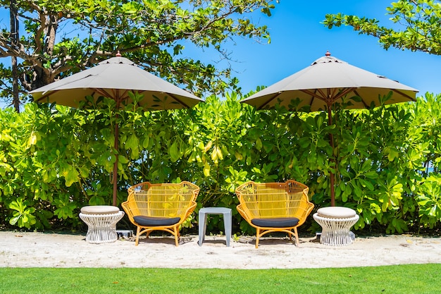 Free Photo Umbrella And Chair On The Beach And Sea With Blue Sky