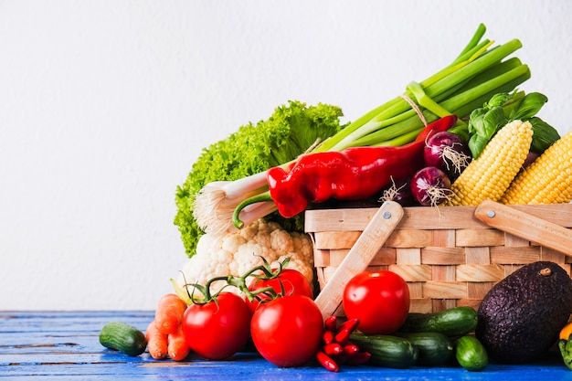 Uncooked vegetables in basket Free Photo