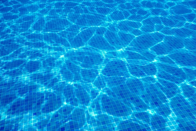 Premium Photo | Underwater swimming pool blue tile, water ripples of ...