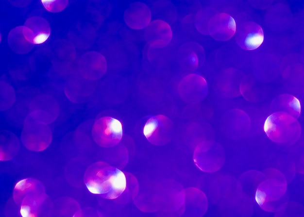 やり場のない紫色のキラキラ背景 無料の写真