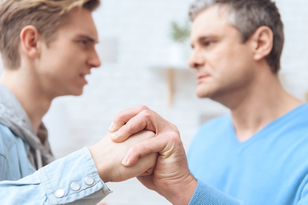 premium-photo-unhappy-father-and-son-are-fighting