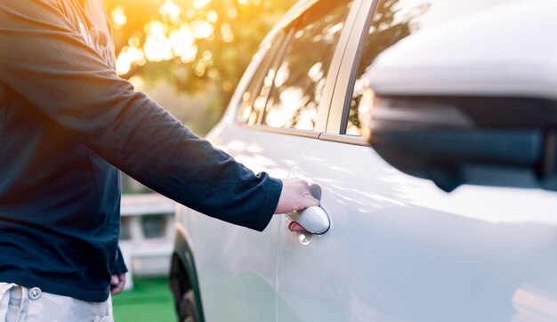 Premium Photo | Using remote control for open and lock the car door.