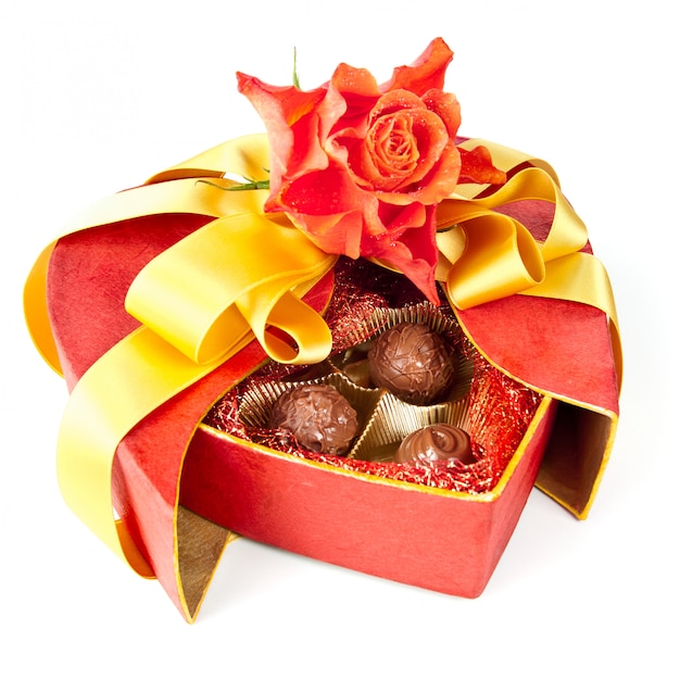 Premium Photo | Valentine chocolates and a rose isolated on whit