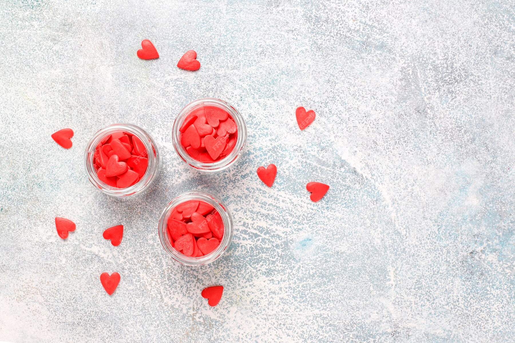 Free Photo | Valentine’s day red heart shaped sprinkles.