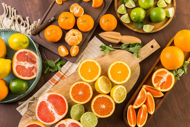 Premium Photo | Variety of citrus fruit including lemons, lines ...