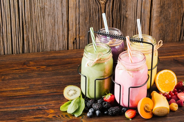 Premium Photo | Variety of fruit and smoothies composition