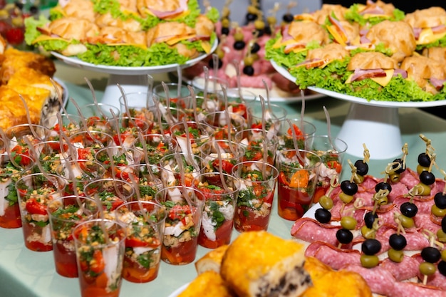Premium Photo Variety Of Tasty Delicious Snacks Buffet Table