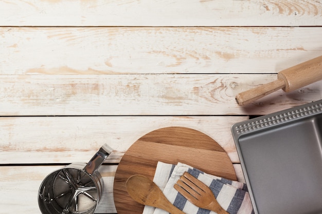 Premium Photo  Various kitchen utensils on wooden table