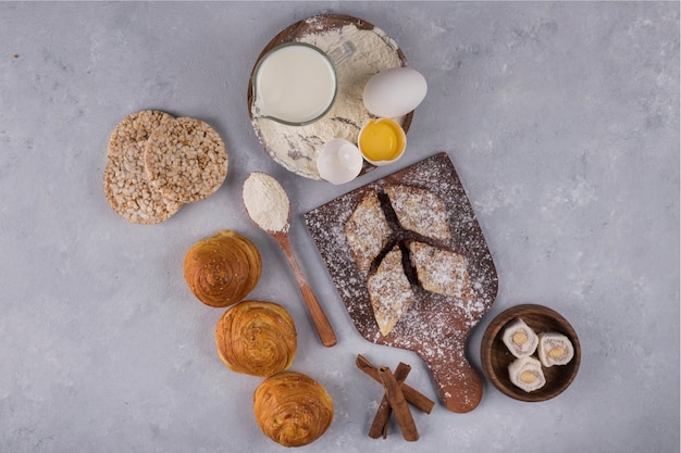 Free Photo | Various pastries and ingredients on the table