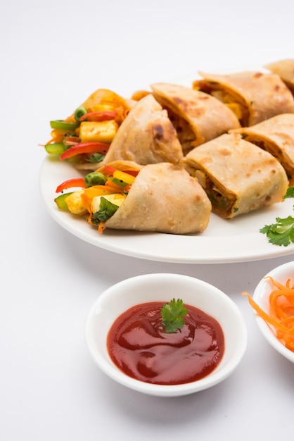 Premium Photo | Veg spring roll or wrap or franky, made using paneer ...