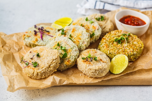 Vegan cutlets (burgers) of lentils, chickpeas and beans. healthy vegan food concept, detox dish, plant based diet. Premium Photo