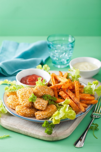 Premium Photo | Vegan soy nuggets and sweet potato fries