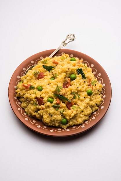 Premium Photo Vegetable Dalia Or Daliya Khichadi Or Broken Wheat