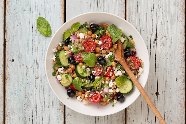 Premium Photo | Vegetarian salad quinoa, tomatoes, cucumbers, chickpeas ...