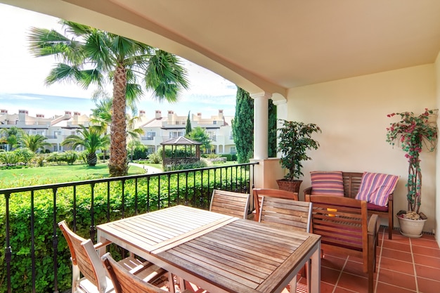 Premium Photo | Veranda estates with views the green garden.