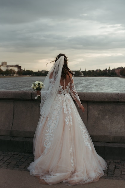 wearing a white wedding dress