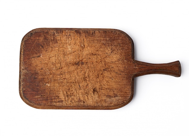 Premium Photo | Very old vintage cutting board with a handle made of oak