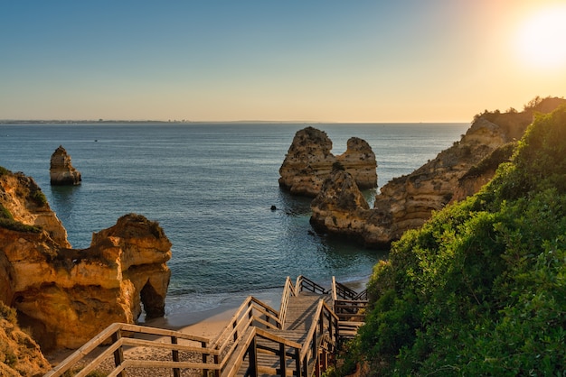 Premium Photo | View of camilo beach, at sunrise, in lagos in the algarve.