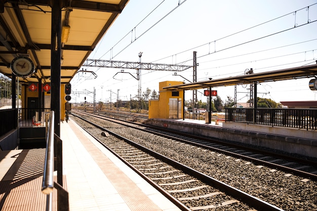 View of empty railway station with railroad Free Photo